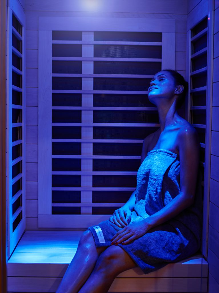 Woman in infrared sauna